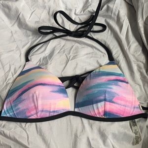 Pink triangle bikini top.